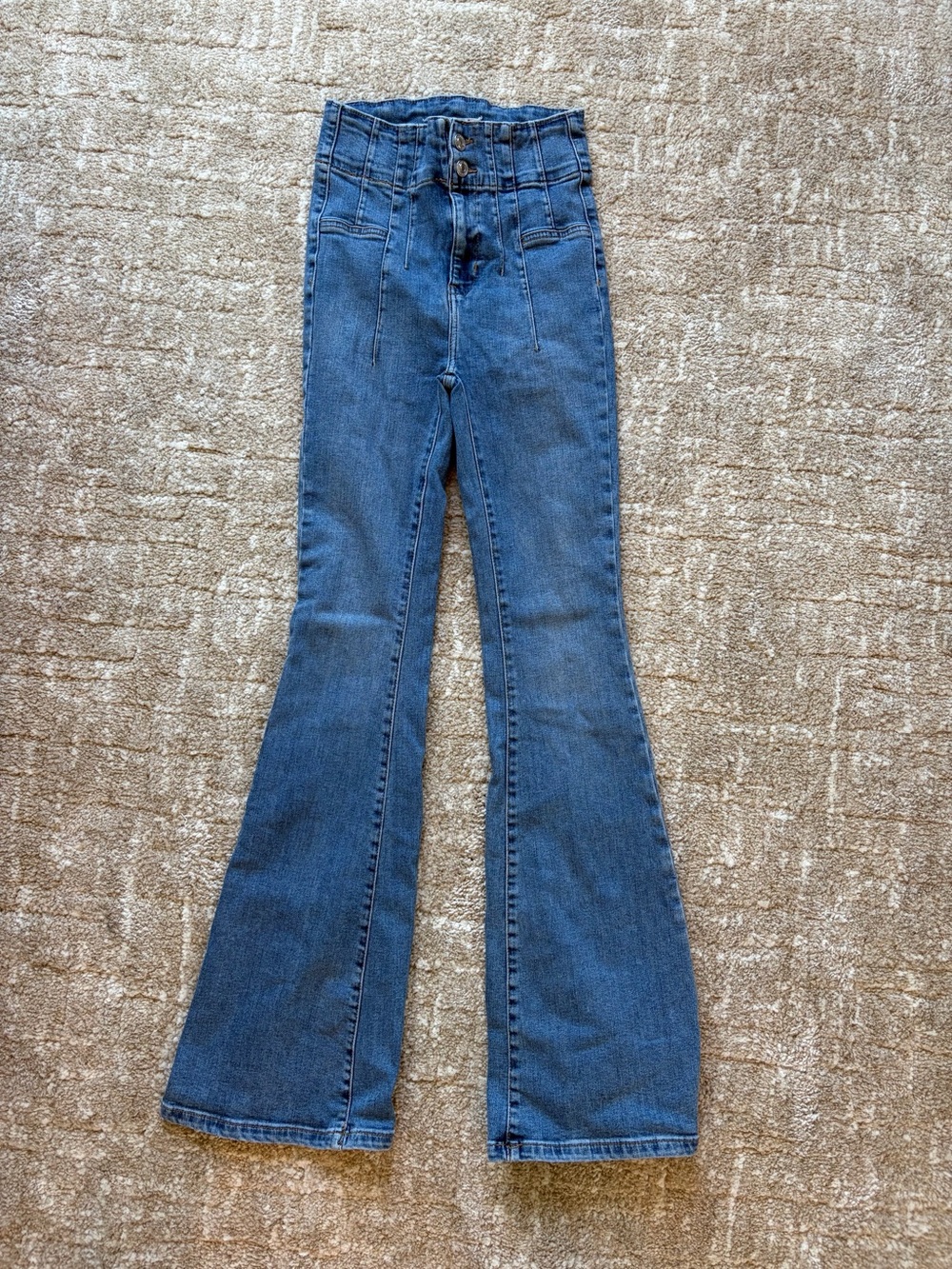 We the Free High-Rise Blue Flared Jeans with Button-Front Waist